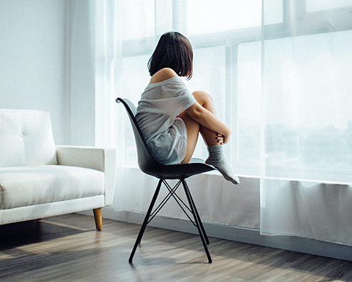 Girl Looking Out Window